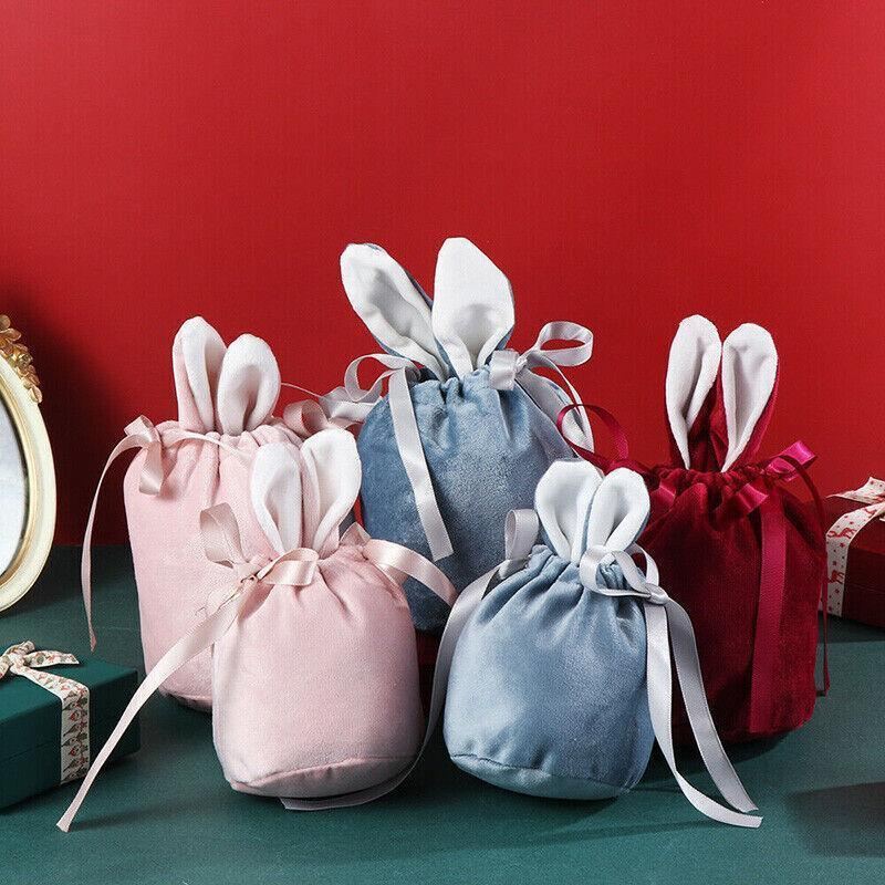 A collection of colorful Easter gift bags filled with holiday treats and goodies.