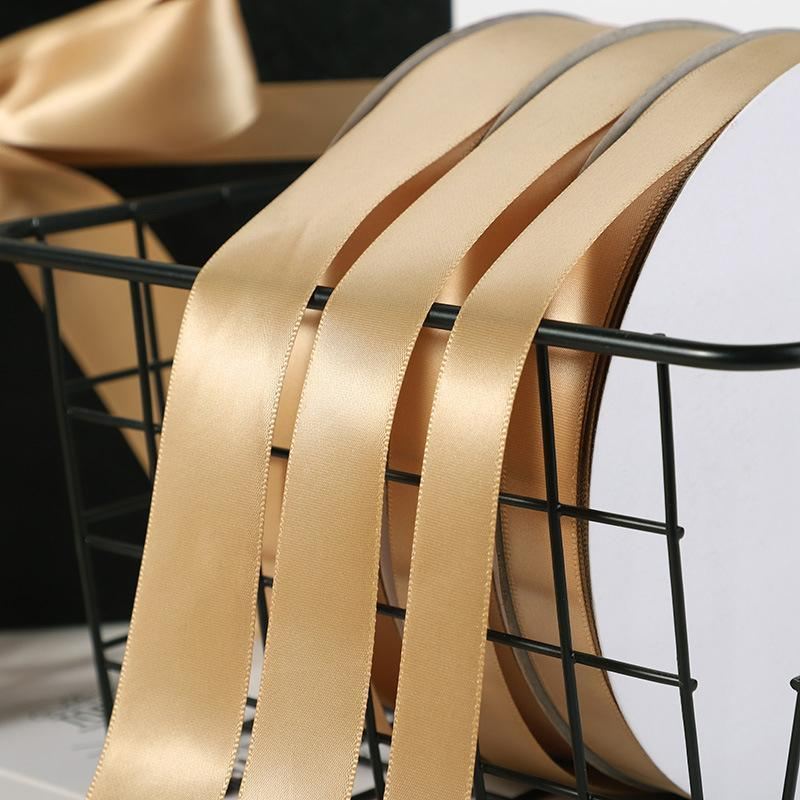 Luxurious and versatile gold ribbon for decorating and crafting.