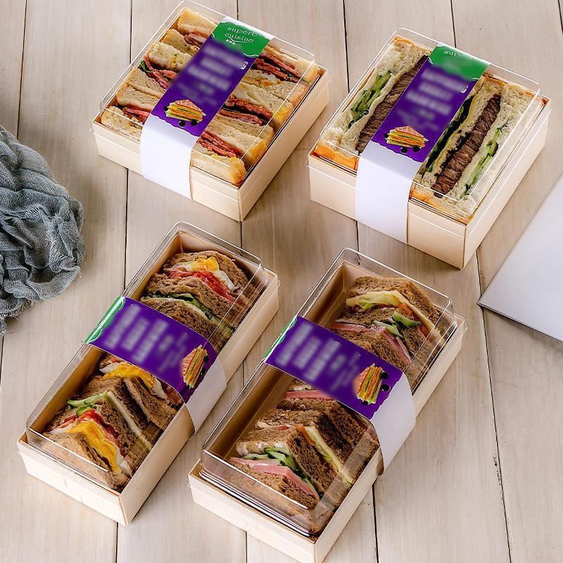 Cake containers with clear lids displaying a delicious cake inside