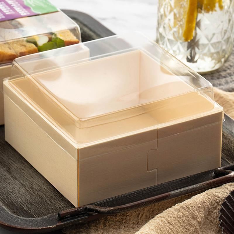 Cake containers with clear lids displaying a delicious cake inside