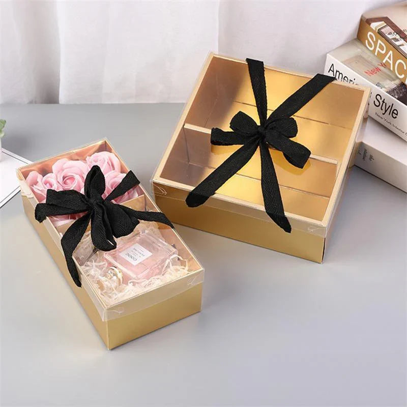 Elegant golden gift boxes with clear lid, perfect for special occasions