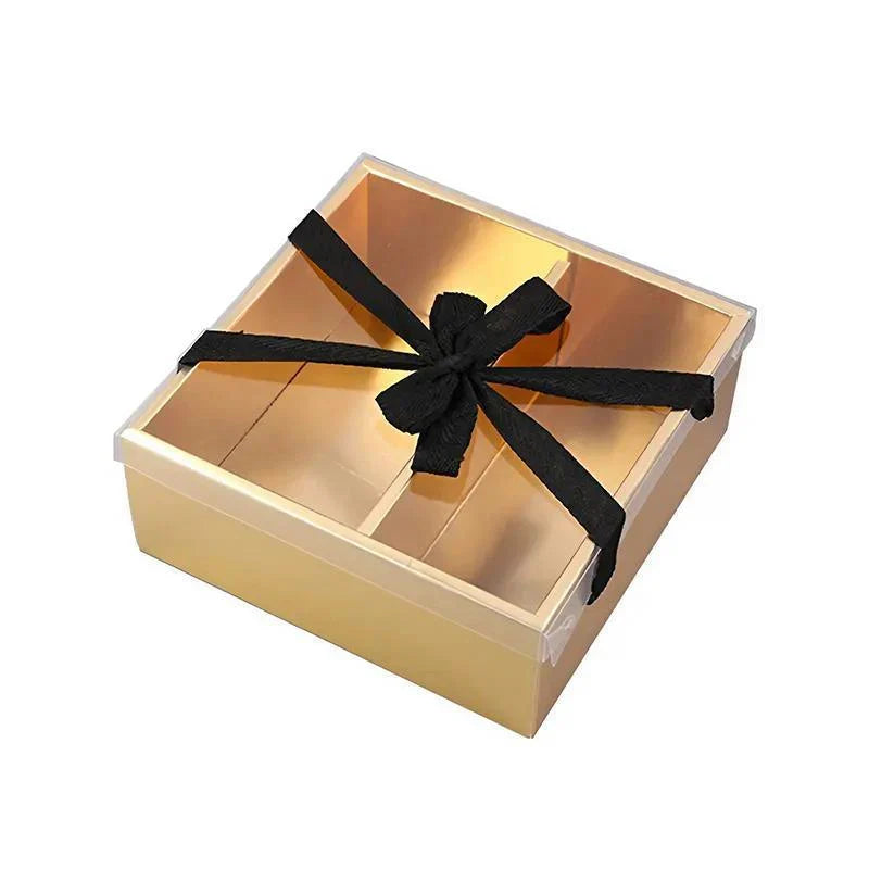 Elegant golden gift boxes with clear lid, perfect for special occasions