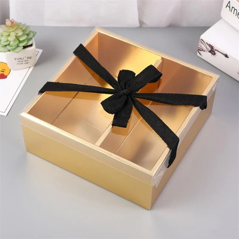 Elegant golden gift boxes with clear lid, perfect for special occasions