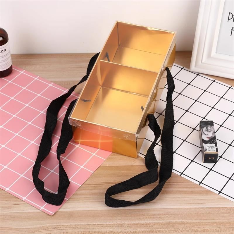 Elegant golden gift boxes with clear lid, perfect for special occasions