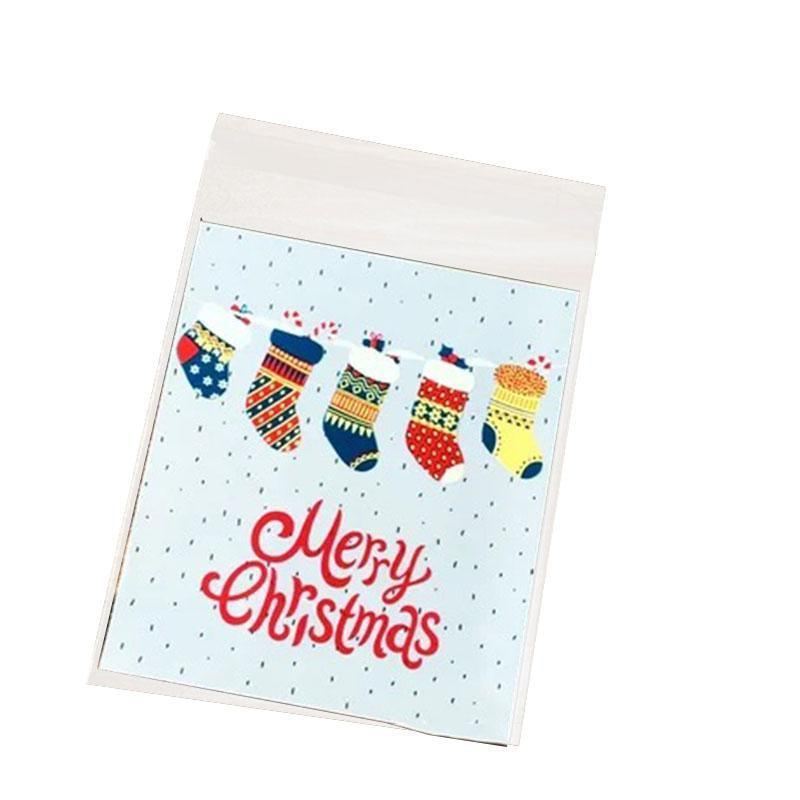 Assorted Christmas Gift Pouches decorated with festive ribbons and snowflakes