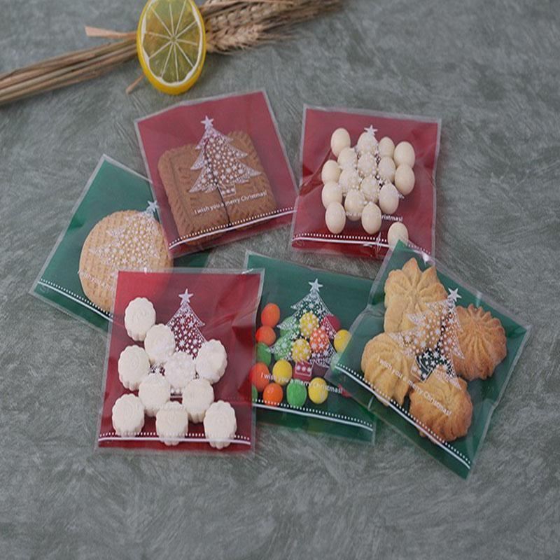 Assorted Christmas Gift Pouches decorated with festive ribbons and snowflakes