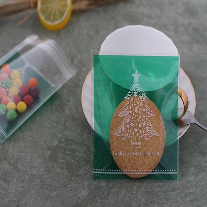 Assorted Christmas Gift Pouches decorated with festive ribbons and snowflakes