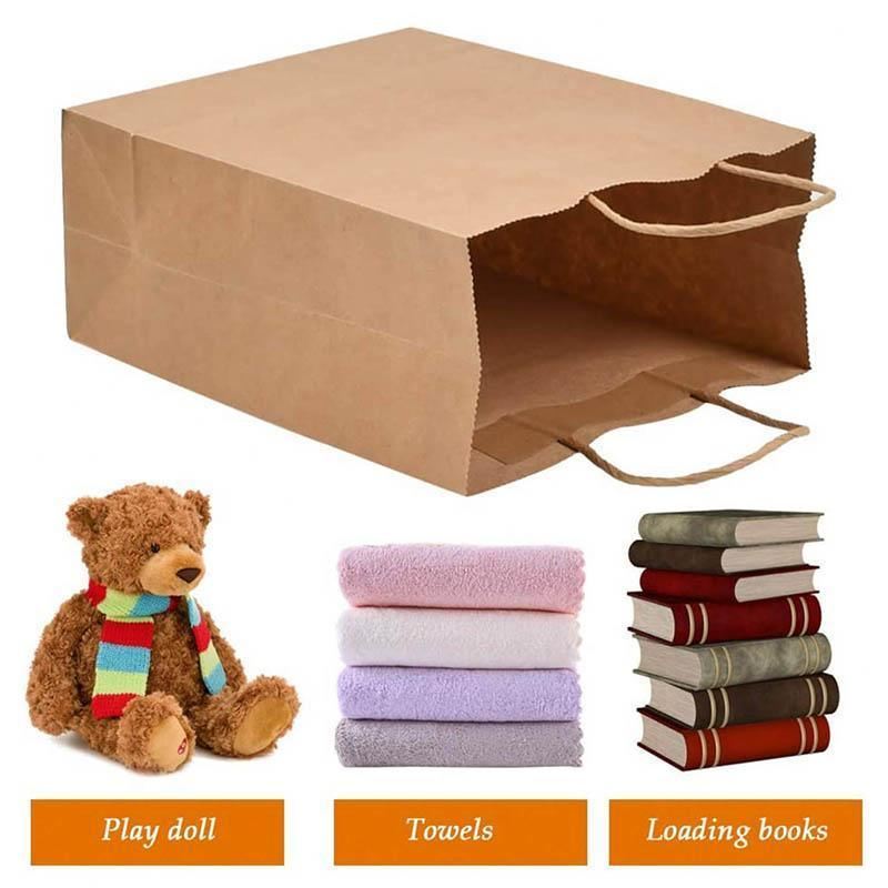 A selection of Paper Bags with Handles in various sizes on a store display