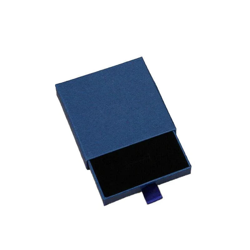 Elegant Jewelry Box Case open on a dresser with various jewelry compartments