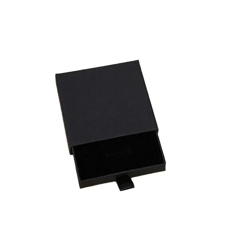 Elegant Jewelry Box Case open on a dresser with various jewelry compartments