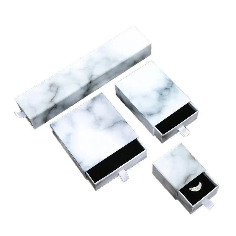 Elegant Jewelry Box Case open on a dresser with various jewelry compartments