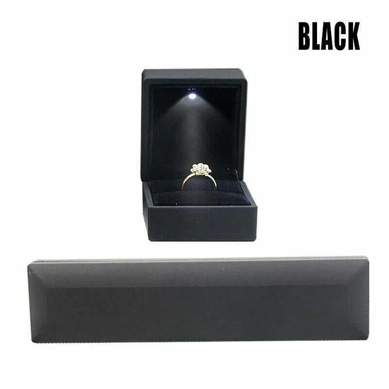 Elegant LED Jewelry Case open, displaying illuminated necklaces and rings.