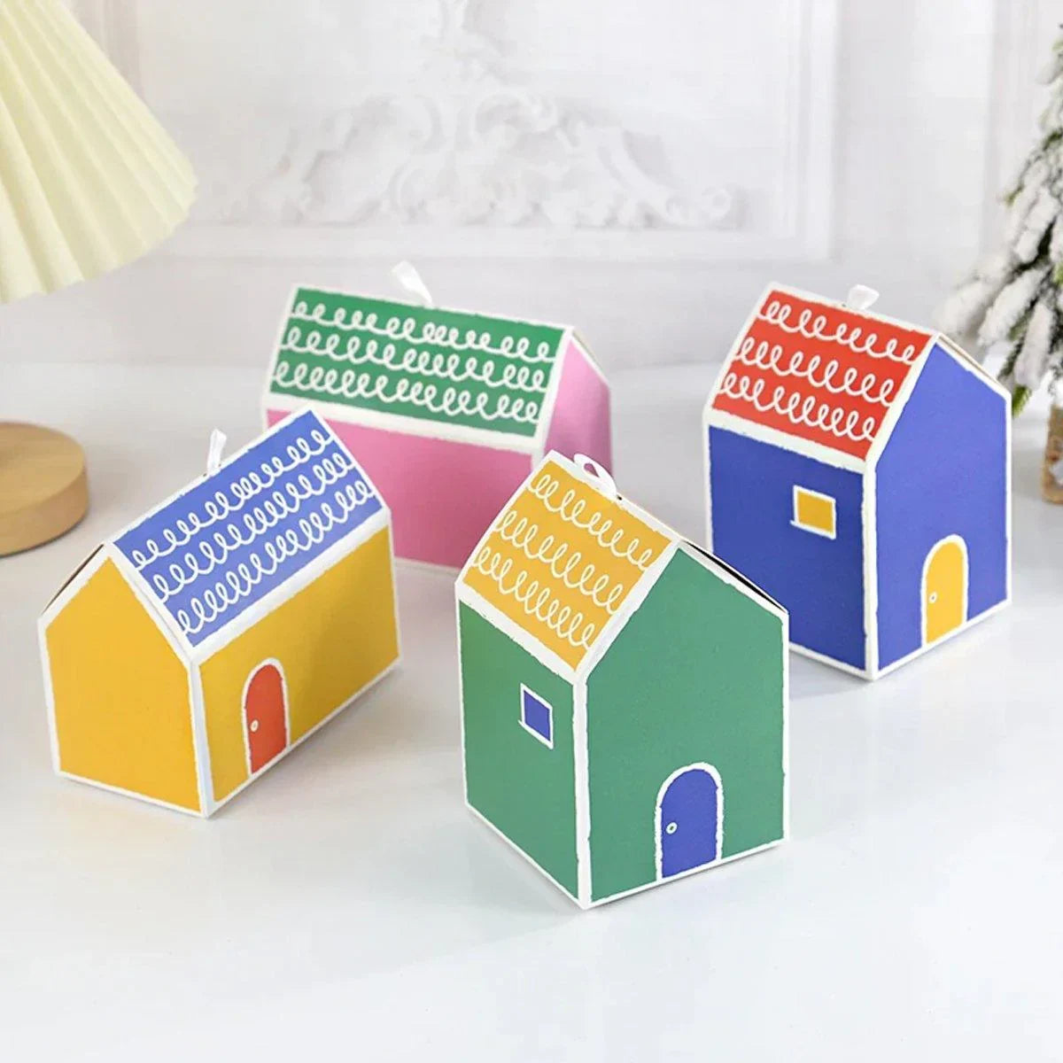 Add a touch of whimsy and colour to your next event with these charming small house gift boxes.