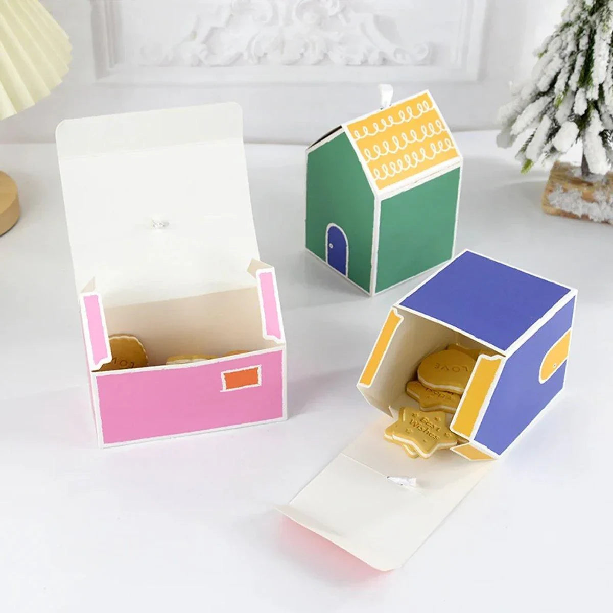 Add a touch of whimsy and colour to your next event with these charming small house gift boxes.