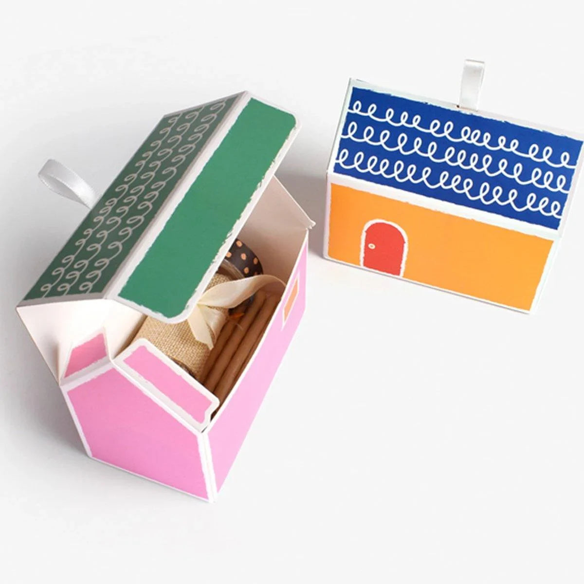 Add a touch of whimsy and colour to your next event with these charming small house gift boxes.