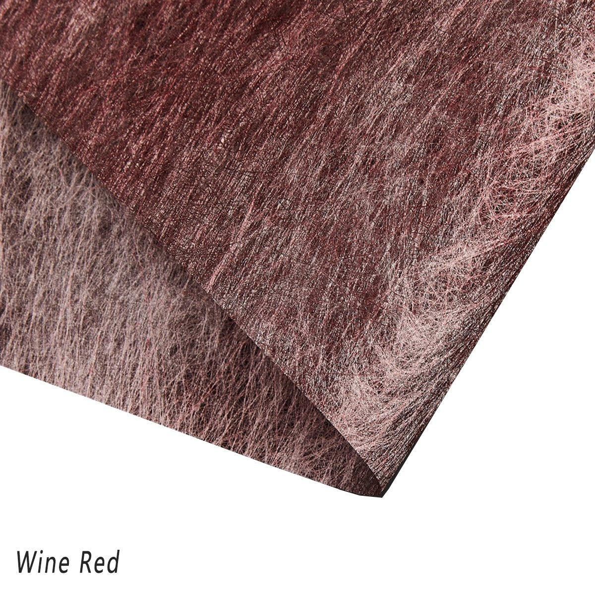 A selection of fabric sheets in various colors, including pink, white, brown, and blue.