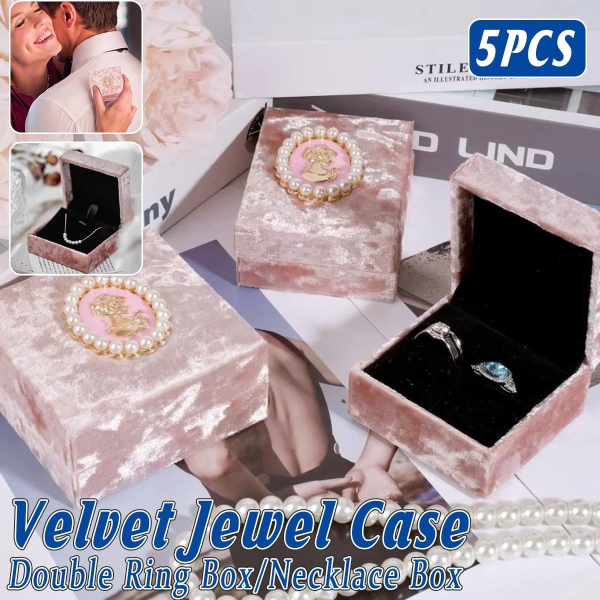 Add a touch of vintage elegance to your jewelry presentation with this 5-Piece Set of Pink Velvet Jewelry Boxes.