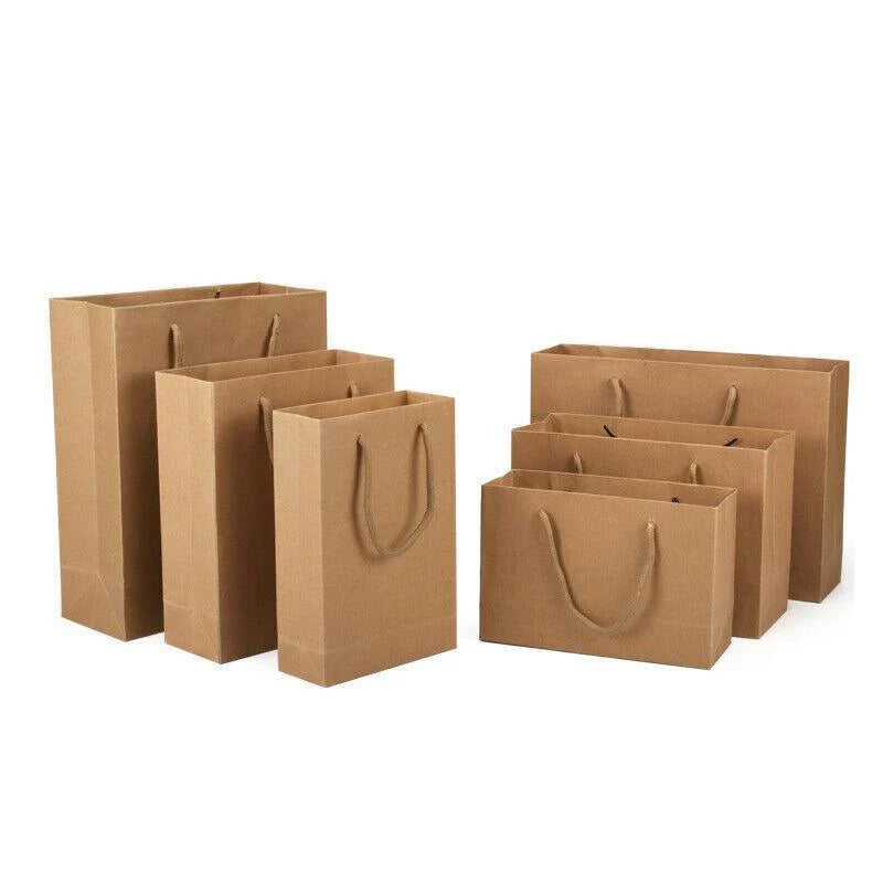 A collection of natural brown kraft paper bags with twisted paper handles, ready for versatile use.