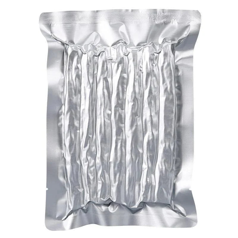 Food saver bags neatly packed with fresh vegetables, showcasing their airtight sealing capability