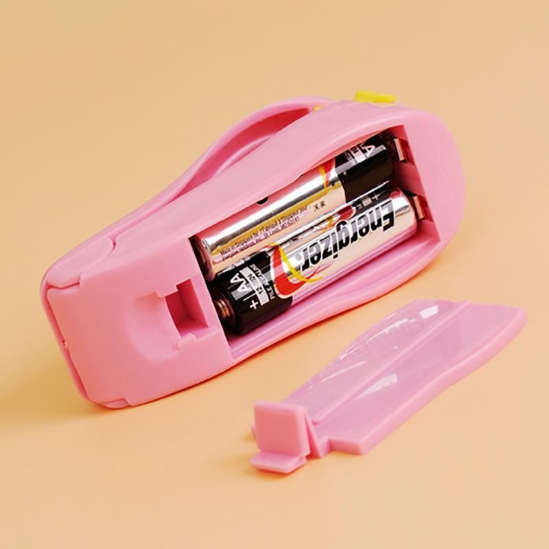 Using a hand held heat sealer to seal a plastic bag