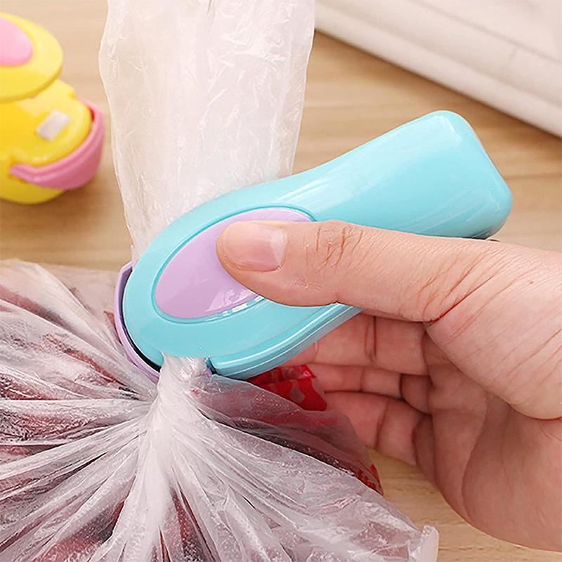 Using a hand held heat sealer to seal a plastic bag