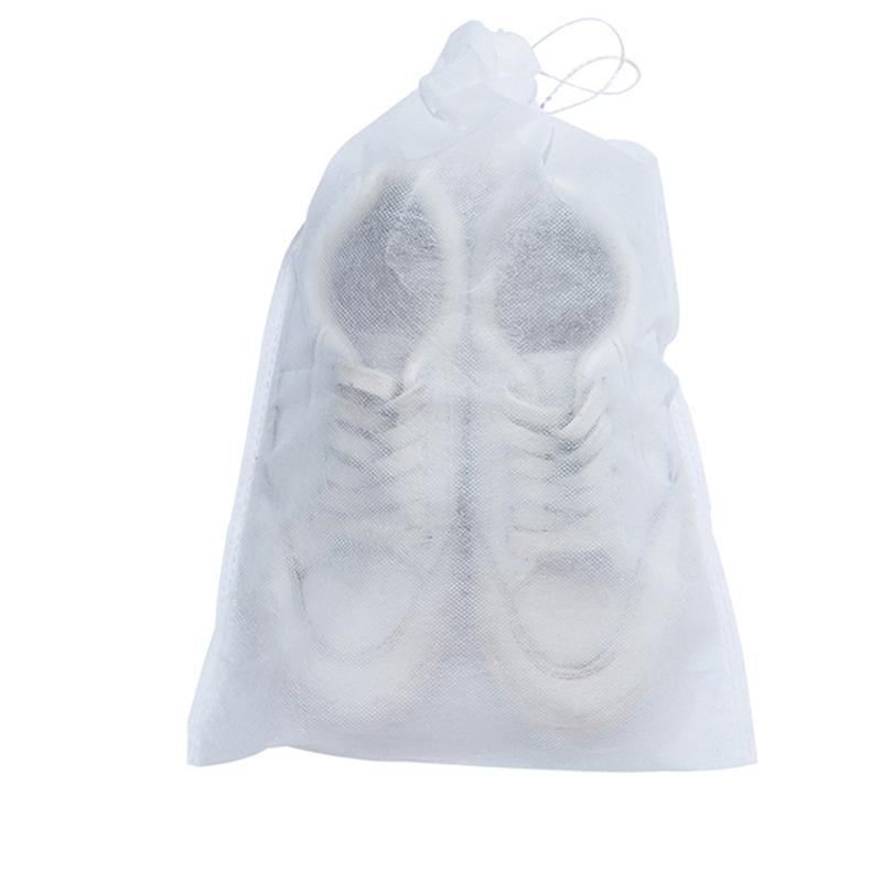 A pair of sneakers neatly stored in a Shoe Bag on a travel adventure.