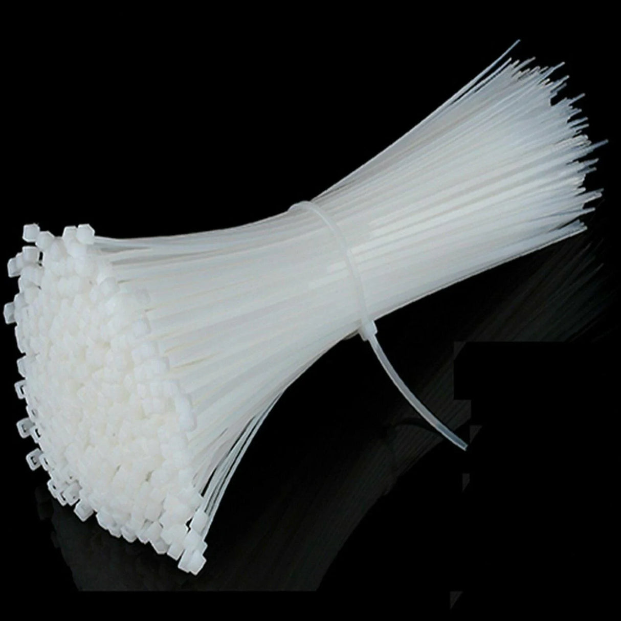 An array of neatly organized cables secured with white wire ties, enhancing both functionality and aesthetics.