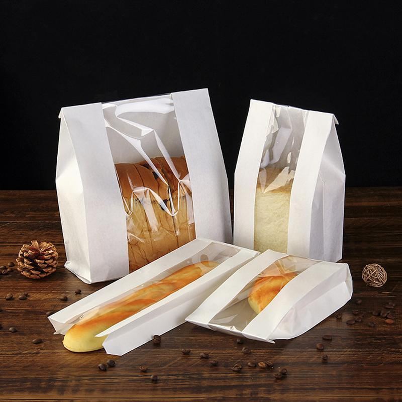 Kraft paper bags with strip window showcasing baked goods