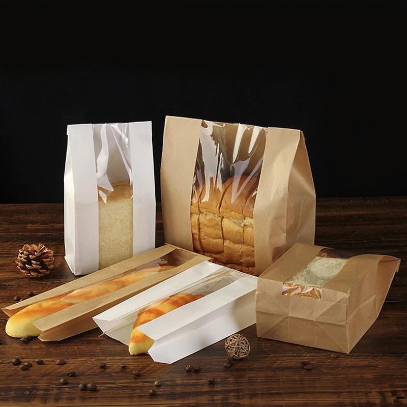 Kraft paper bags with strip window showcasing baked goods