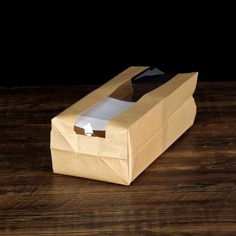 Kraft paper bags with strip window showcasing baked goods