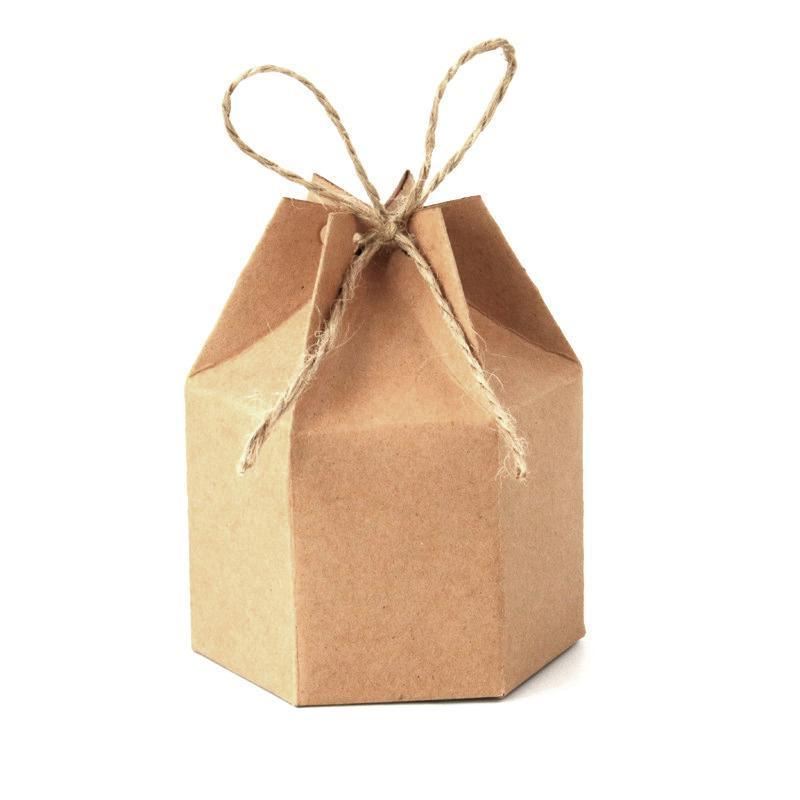 Assorted sizes of Kraft Paper Gift Boxes stacked on a wooden table