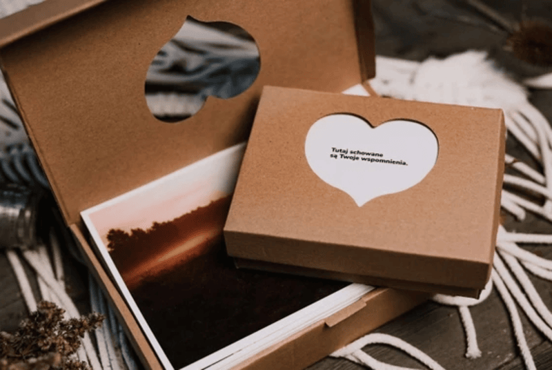 A brown custom mailer box with heart-shaped cutouts