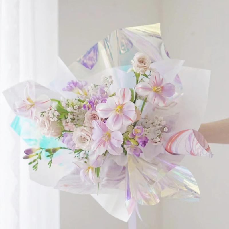 Exquisite gift wrapped with flower gift wrapping paper