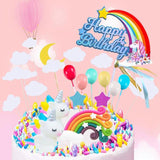 Whimsical unicorn cake topper with rainbow mane and golden horn