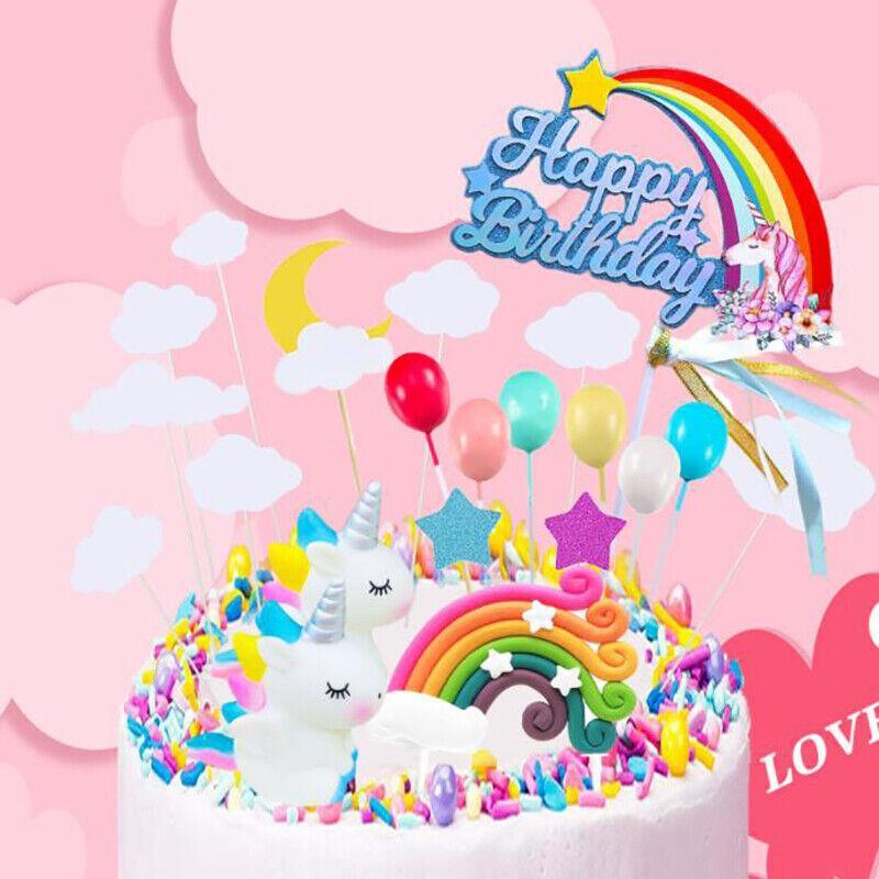 Whimsical unicorn cake topper with rainbow mane and golden horn