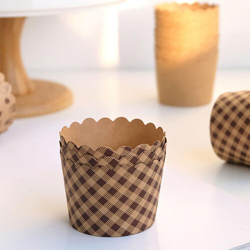 Stylish cupcake holders on display table