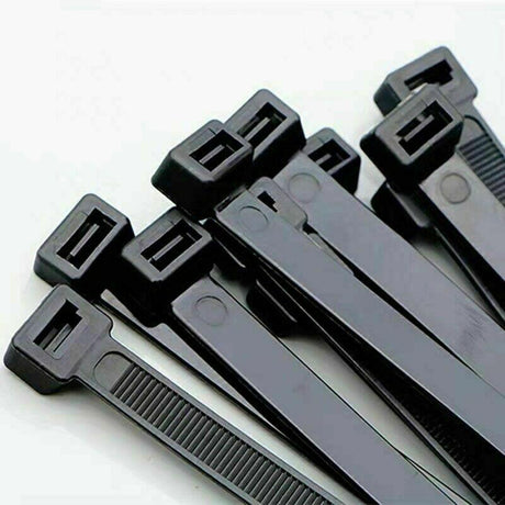 Plastic cable ties neatly organizing cables and wires, showcasing their durability and strength