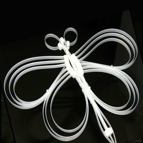 An array of neatly organized cables secured with white wire ties, enhancing both functionality and aesthetics.