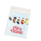 Assorted Christmas Gift Pouches decorated with festive ribbons and snowflakes