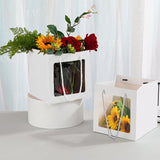 Elegant White Paper Bags lined up on a store counter, ready for customer purchases.