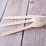 Eco-friendly Disposable Cutlery set laid out on a festive table