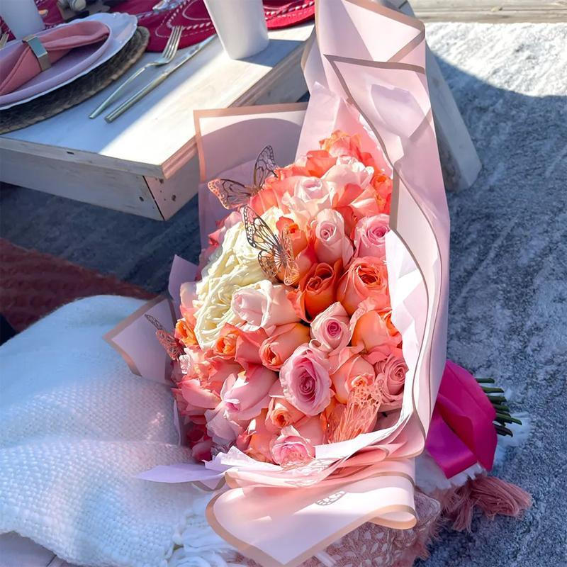 Bouquet of flowers wrapped in elegant flower wrapping paper