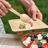 Eco-friendly Disposable Cutlery set laid out on a festive table