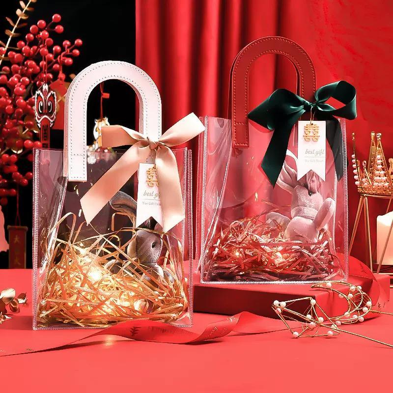 Set of elegant transparent goodie bags with sturdy handles