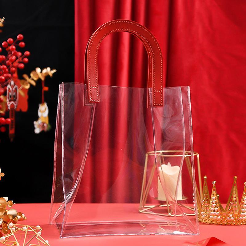 Set of elegant transparent goodie bags with sturdy handles