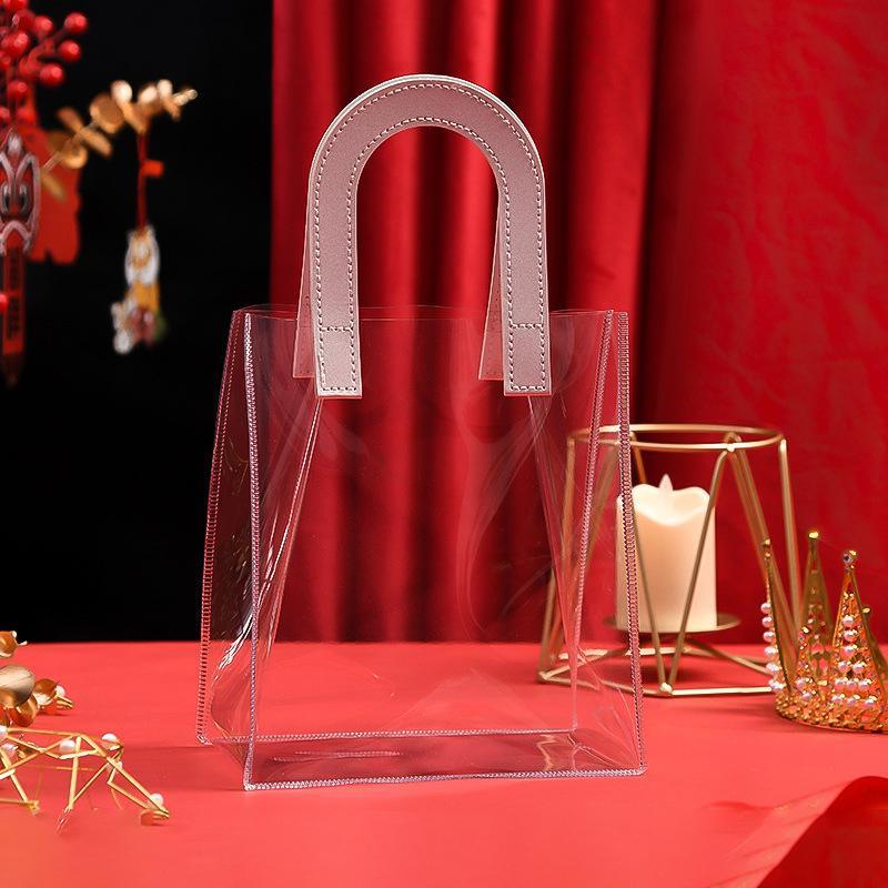 Set of elegant transparent goodie bags with sturdy handles