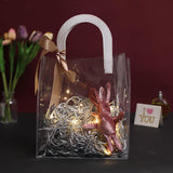 Set of elegant transparent goodie bags with sturdy handles