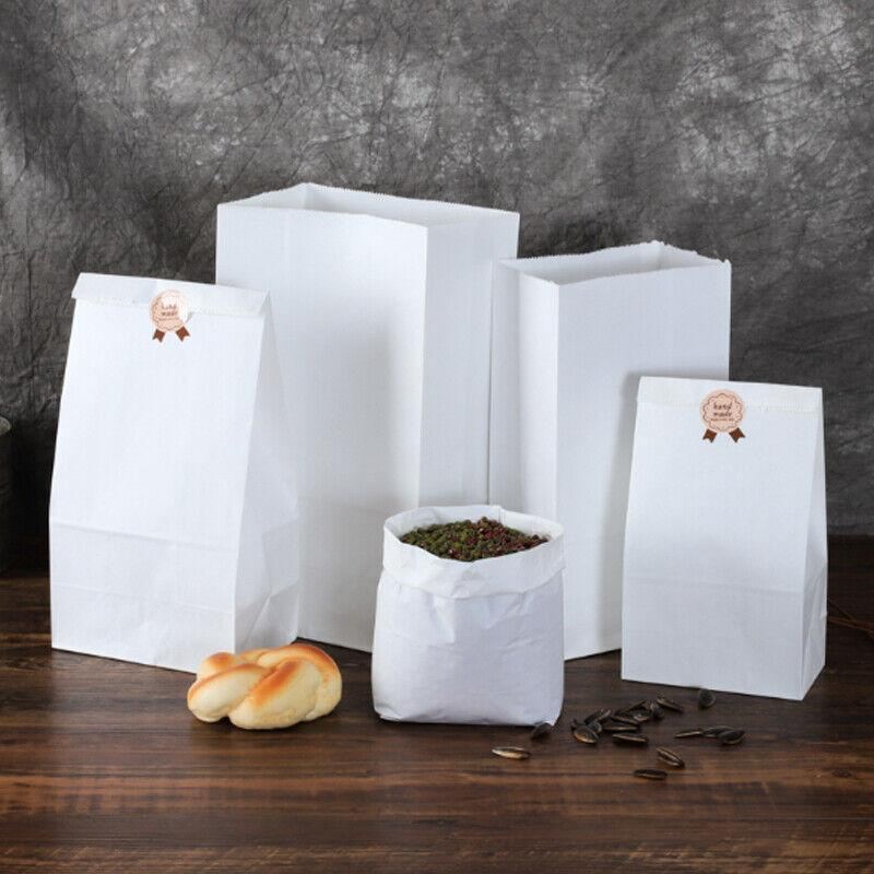White recylced paper bag with a flat base, ideal for takeout and food service packaging