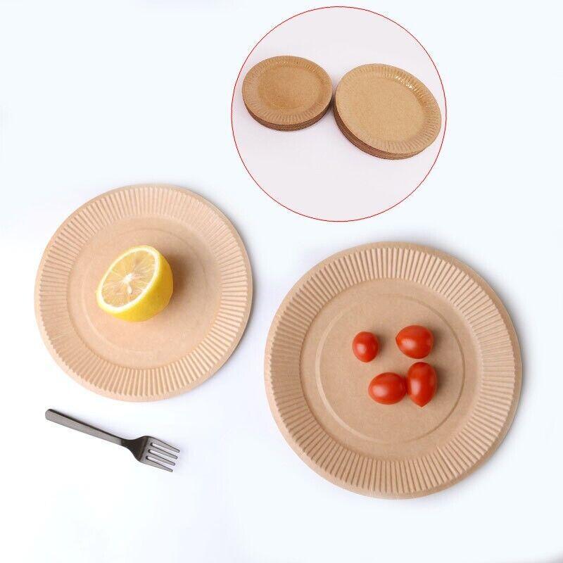 An assortment of food served on high-quality disposable plates at a festive gathering.