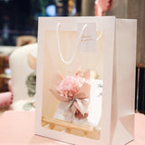 Set of stylish window paper bags with clear window and sturdy handles